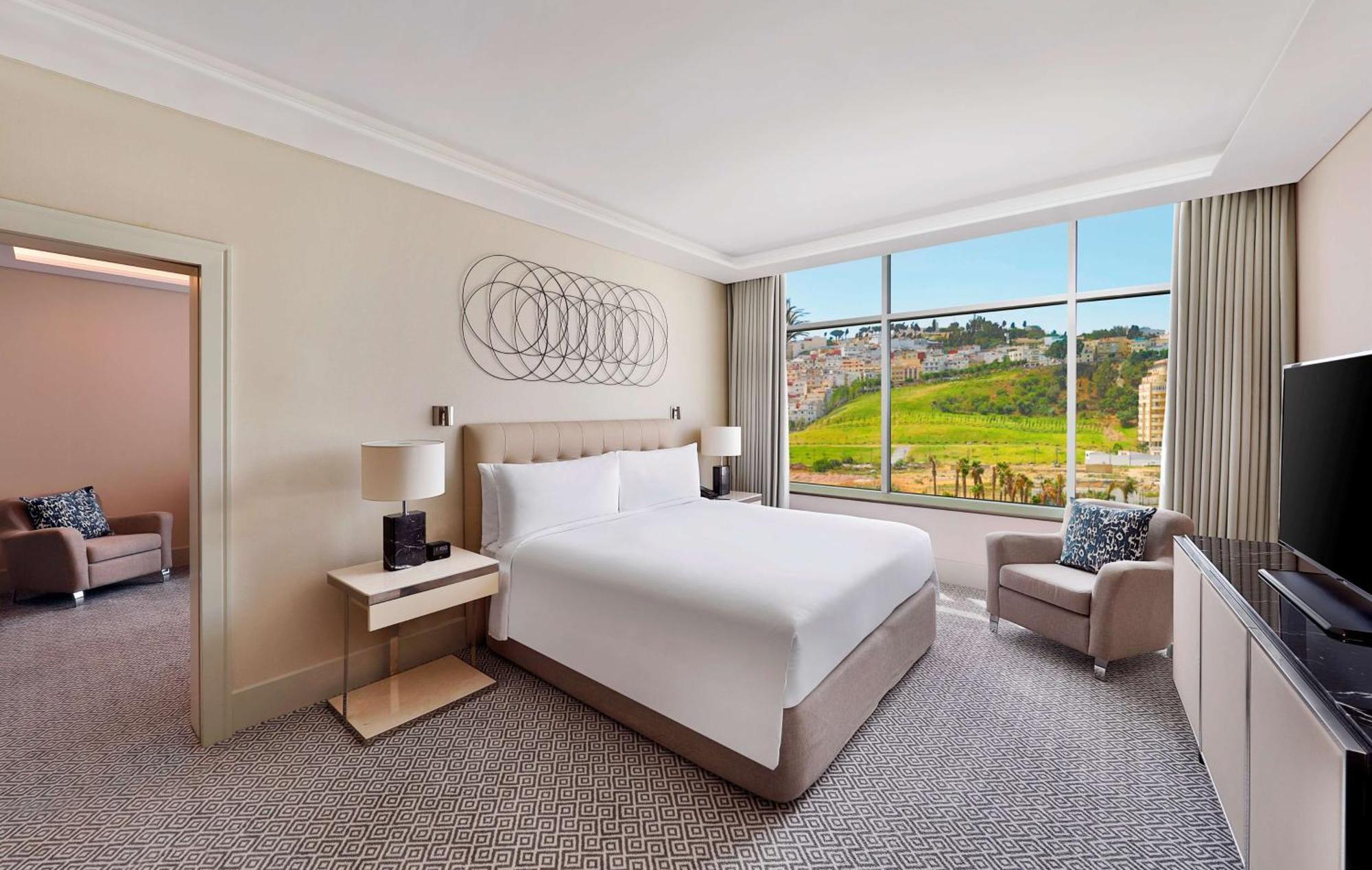 Hilton Tanger City Center Esterno foto A bedroom at the Westin Palace, Madrid